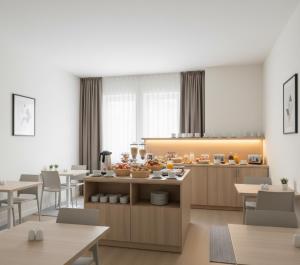 een weergave van een keuken en eetkamer bij Takes Antalya Apart in Antalya