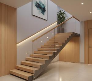 een trap in een huis met glazen leuning bij Takes Antalya Apart in Antalya +7 foto's