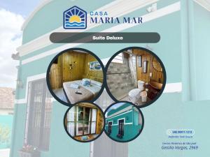 a poster of a bathroom with three circular windows at Casa Maria Mar in São José