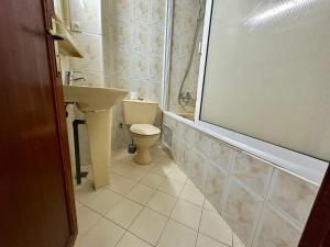 Koupelna v ubytování Jawhara Jacobs apartment + 20 fotografií