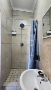 Koupelna v ubytování Sunnyridge Sky East London + 7 fotografií