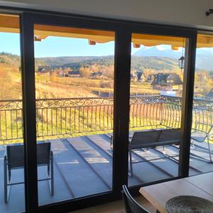a view from the balcony of a house at Siedem Światów Domek in Jurgów +23 photos