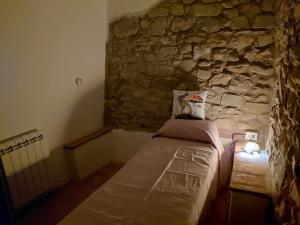 Ένα ή περισσότερα κρεβάτια σε δωμάτιο στο La Dimora di Dida