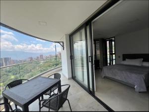 Ένα ή περισσότερα κρεβάτια σε δωμάτιο στο Huge Apartment for families at Poblado +108 φωτογραφίες