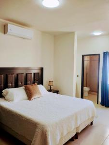 Postel nebo postele na pokoji v ubytování STARFISH Maeva Residencial