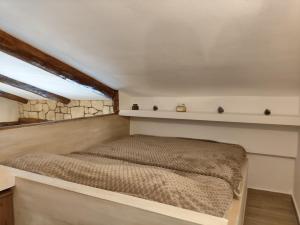 Giường trong phòng chung tại Λαγουδόσπιτο