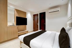 TV a/nebo společenská místnost v ubytování HOTEL O ELVILLA