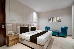 Postel nebo postele na pokoji v ubytování HOTEL O ELVILLA + 22 fotografií