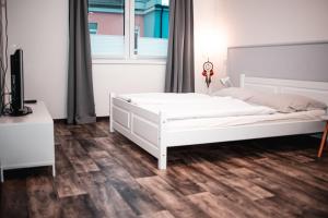 Postel nebo postele na pokoji v ubytování Na Mandlu