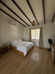 Postel nebo postele na pokoji v ubytování Malibu beach