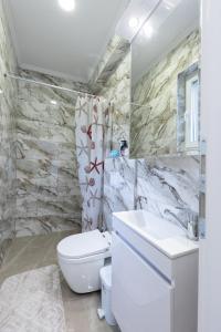 Koupelna v ubytování NolE Apartments