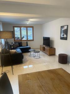 Χώρος καθιστικού στο Apartments Soldanella +32 φωτογραφίες