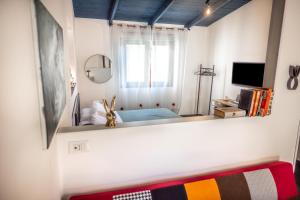 Μια τηλεόραση ή/και κέντρο ψυχαγωγίας στο NellaRiserva25-Vurria