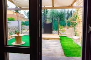 Κήπος έξω από το NellaRiserva25-Vurria