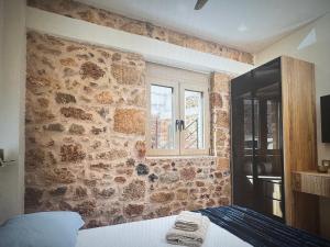 Ένα ή περισσότερα κρεβάτια σε δωμάτιο στο Malia super views