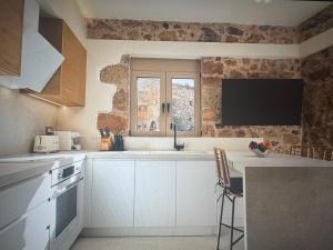 Η κουζίνα ή μικρή κουζίνα στο Malia super views