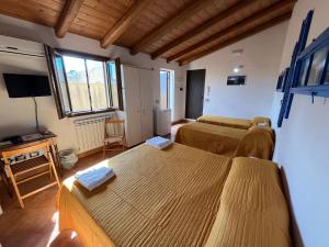 TV a/nebo společenská místnost v ubytování Dimora Tipica