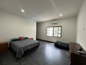 Postel nebo postele na pokoji v ubytování Quinta privada con alberca y espacios amplios + 7 fotografií