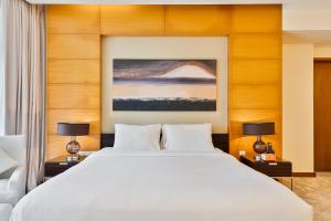 Ένα ή περισσότερα κρεβάτια σε δωμάτιο στο Luxurious Studio with Burj Khalifa View Direct Dubai Mall Access - Kempinski Residence