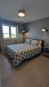 Ένα ή περισσότερα κρεβάτια σε δωμάτιο στο Vivace Vineyard Guest House