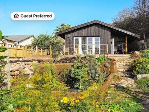 a house with a garden in front of it at 4 person holiday home in Skärhamn-By Traum in Skärhamn