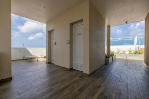 Fotografie z fotogalerie ubytování BRAND NEW 1BR Condo w/Pool, Patio, GYM @ PalmBeach v destinaci Palm-Eagle Beach + 24 fotografií