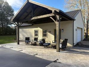 a pavilion with chairs and tables on a patio at Private 5-Acre Retreat In-Ground Pool Hot Tub in Oberlin +90 photos