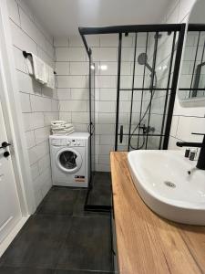 Koupelna v ubytování New Gudauri apartments by ProGudauri + 47 fotografií