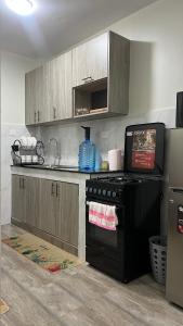 Η κουζίνα ή μικρή κουζίνα στο Amber home