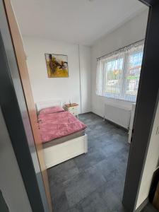 Ένα ή περισσότερα κρεβάτια σε δωμάτιο στο Wohnung 6 Toni