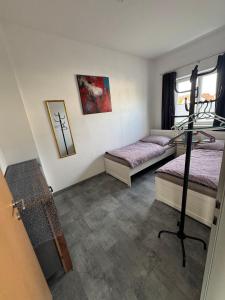 Ένα ή περισσότερα κρεβάτια σε δωμάτιο στο Wohnung 6 Toni