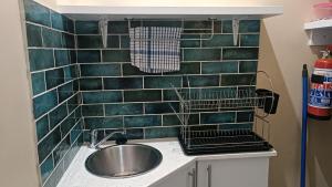 Kuchyň nebo kuchyňský kout v ubytování 27 on Brunswick