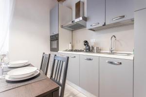 Η κουζίνα ή μικρή κουζίνα στο AM1 - Elegant three-room apt in the center