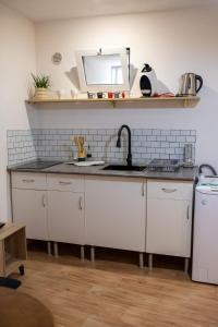 Η κουζίνα ή μικρή κουζίνα στο La bodega de la Yaya