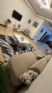 Χώρος καθιστικού στο Masaki H and Apartment