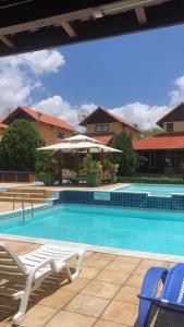 Swimmingpoolen hos eller tæt på Casa 11 Condomínio Completo 4qts