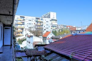 an overhead view of a city with buildings and roofs at Funktastic Central Maksimir Condo in Zagreb