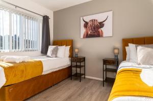 Voodi või voodid majutusasutuse Headingley Lodge - Modern Home Near City Centre Perfect For Contractors toas