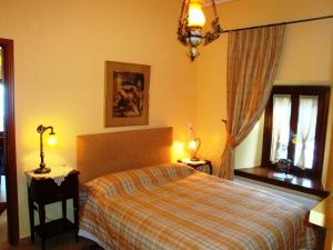 Posteľ alebo postele v izbe v ubytovaní Guesthouse Kleopatra's
