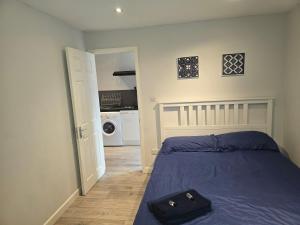 Ένα ή περισσότερα κρεβάτια σε δωμάτιο στο Two ensuite bedrooms with kitchen