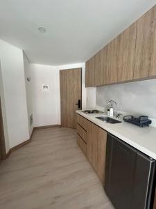 Kuchyň nebo kuchyňský kout v ubytování Estudio moderno en Usaquen,check in facil + 3 fotografie