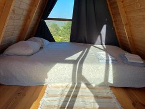 Postel nebo postele na pokoji v ubytování Vicentine Coast Art Cabins