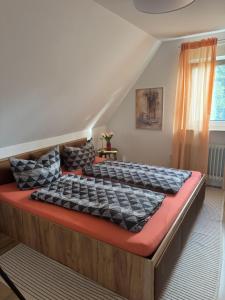 Postel nebo postele na pokoji v ubytování Ferienwohnung Siebenbergen