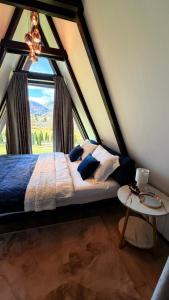 Postel nebo postele na pokoji v ubytování Zago Alpin