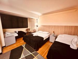 Ένα ή περισσότερα κρεβάτια σε δωμάτιο στο Hotel villa aloha