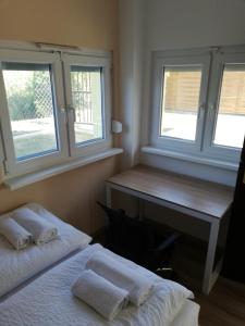 Ένα ή περισσότερα κρεβάτια σε δωμάτιο στο Pecó Kecó