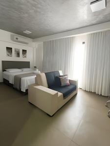 Ένα ή περισσότερα κρεβάτια σε δωμάτιο στο Natureza Viva- Id Vida Urbana +59 φωτογραφίες