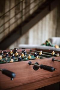 a close up of a wooden chessboard withoc at Gîte du jardinier in Ittre +23 photos