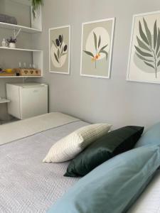 Ένα ή περισσότερα κρεβάτια σε δωμάτιο στο Ótima suíte privada em Torres +15 φωτογραφίες