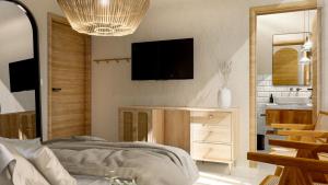 Un televizor și/sau centru de divertisment la Hotel Entrelunas